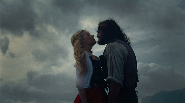 from left to right margot robbie as cathy and jabob elordi as heathcliffe in Wuthering Heights directed by Emerald Fennel