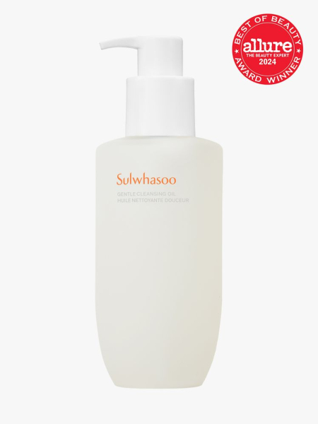 cleansing oil in branded white bottle with white pump on light gray background with red and white 2024 allure best of beauty seal